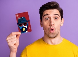 man holding credit card and making money transaction via a smartphone