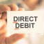 card with direct debit text written on it
