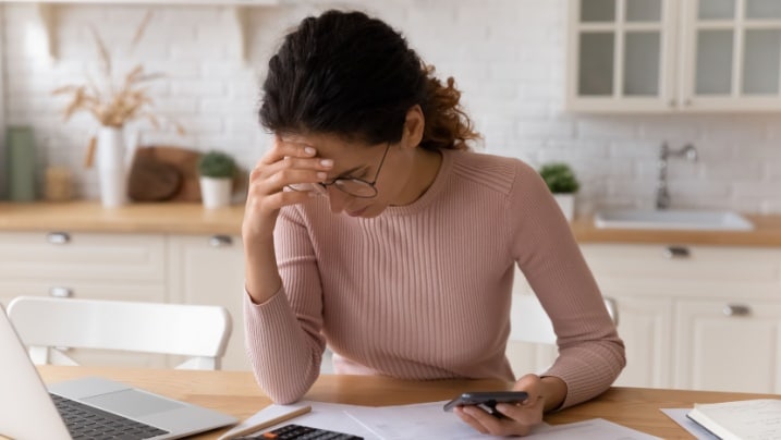 Person reviewing loan statement