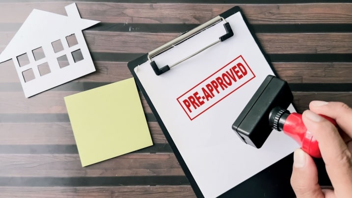Person checking pre-approved loan offer