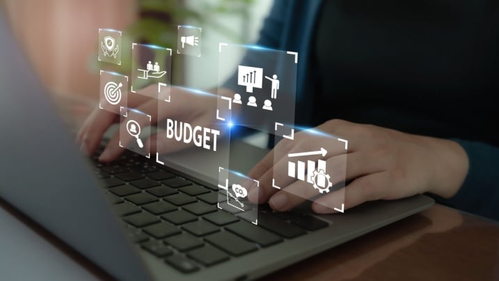 How do regular budget reviews maximise savings?
